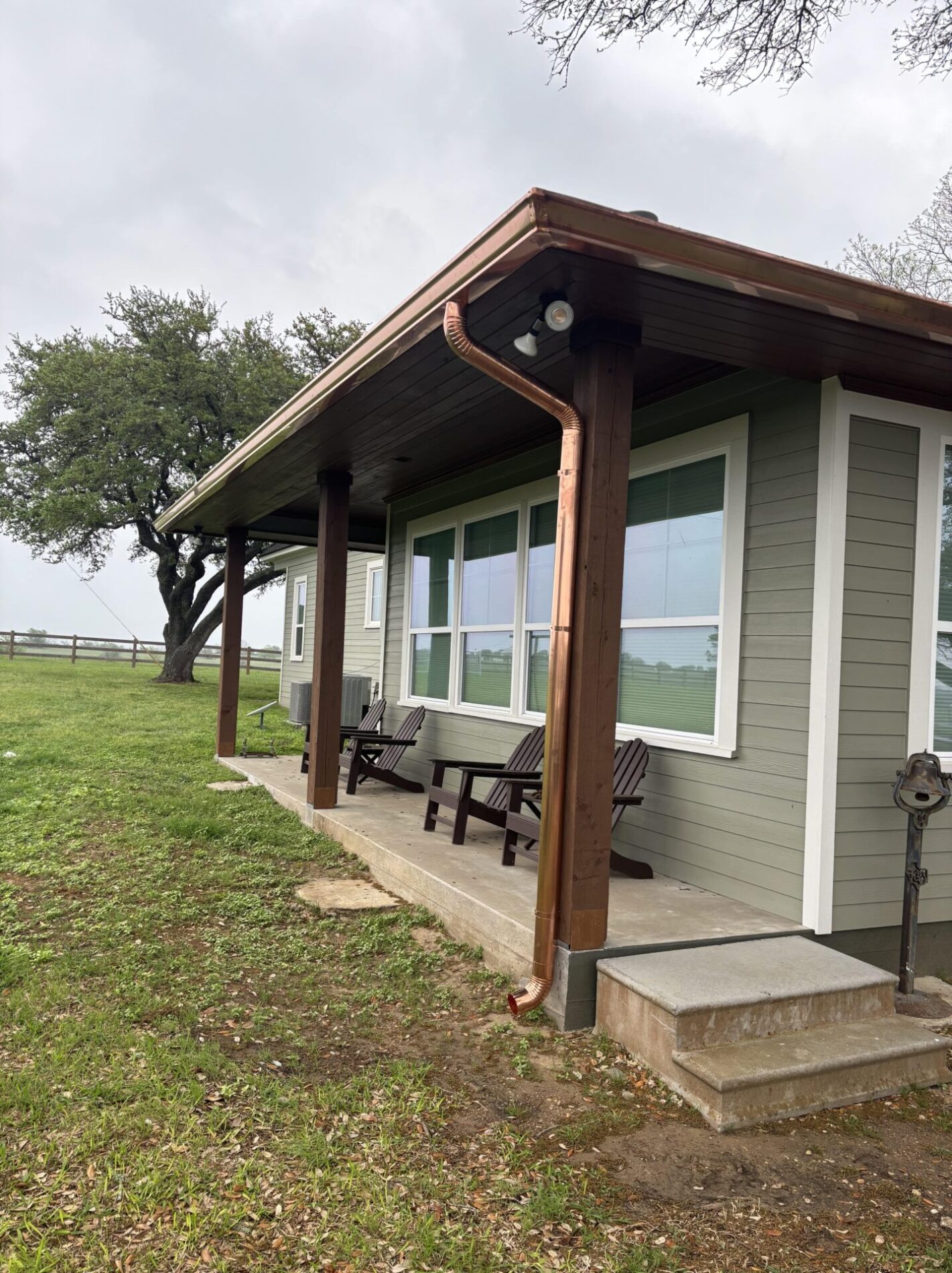 black gutter used as trim on new construction